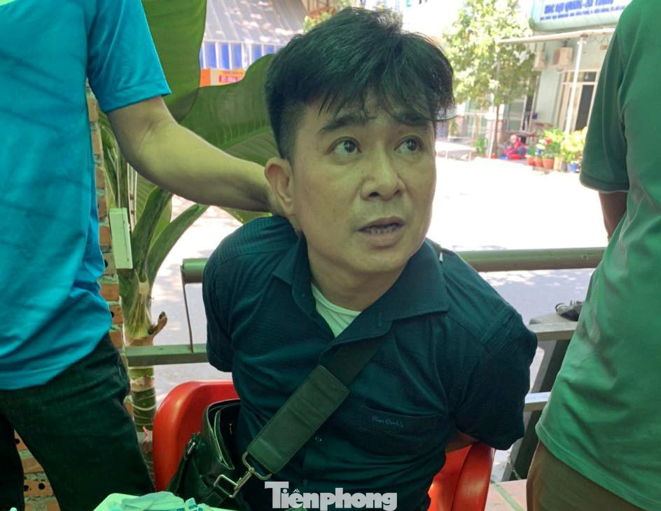 Bắt giữ kẻ xưng nhà báo nhận tiền chạy án ảnh 1