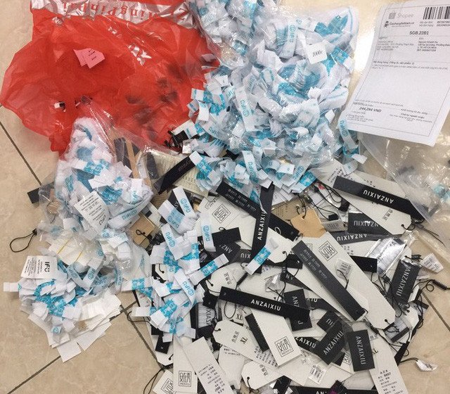 Thu giữ 4 tấn quần áo ngoại thay mác các thương hiệu Việt ảnh 1