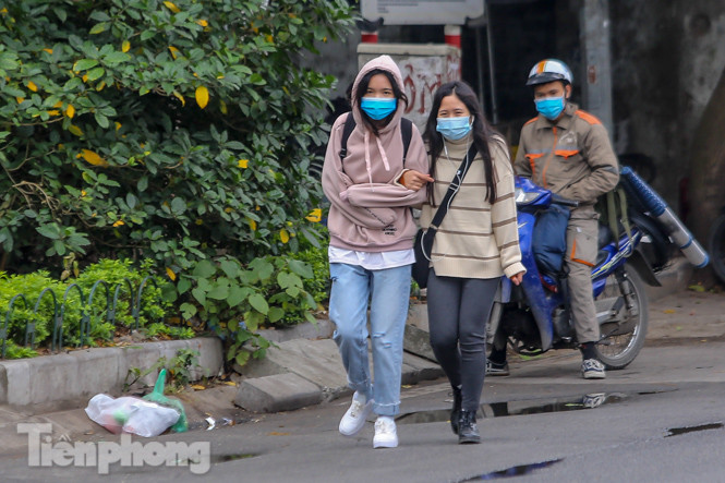 Trời rét đậm đột ngột, người Hà Nội co ro trong nhiều lớp áo ảnh 12