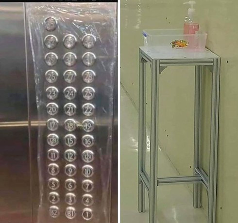 Chung cư Hà Nội thi nhau 'dùng chiêu' bọc nilon chống dịch corona ảnh 2