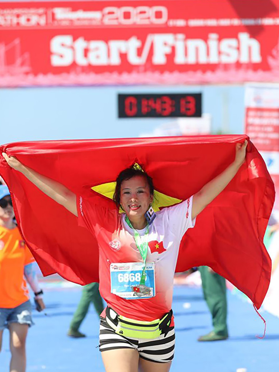 Nụ cười chiến thắng trên đường chạy giữa đại dương ảnh 15