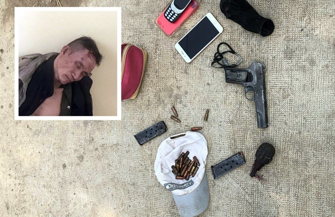 Kẻ cố thủ tại TPHCM mang theo súng K54, nhiều hộp đạn khi bị vây tại Đồng Nai ảnh 1