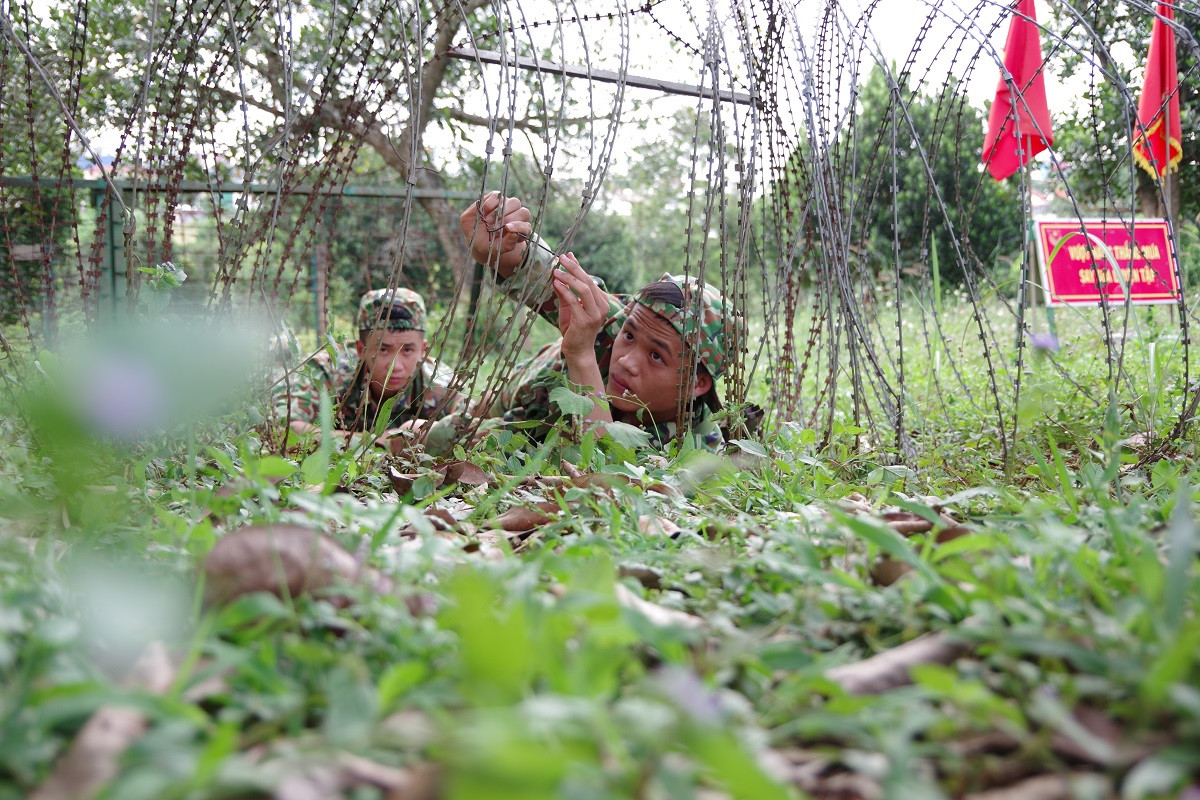 Đại đội trinh sát 'mình đồng da sắt' trên thao trường ảnh 1
