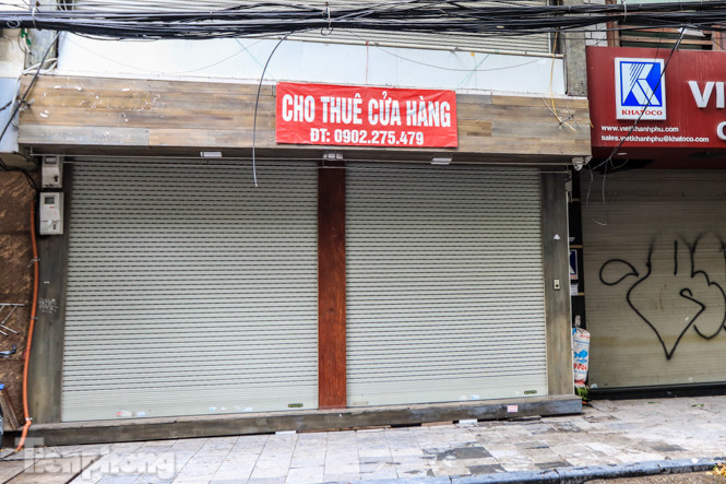 Dịch COVID-19 tái bùng phát, nhiều cửa hàng đất 'kim cương' ở Hà Nội im lìm ảnh 1