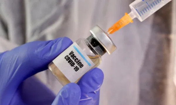 Một vắc-xin COVID-19 sắp ra mắt phải tạm dừng vì “có thể gây bệnh không giải thích được” ảnh 2