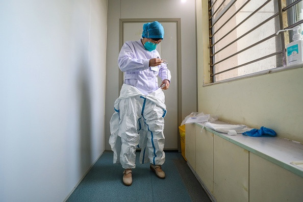 Cách ly tất cả người nghi nhiễm coronavirus ở Vũ Hán, Không quân TQ điều máy bay ảnh 1