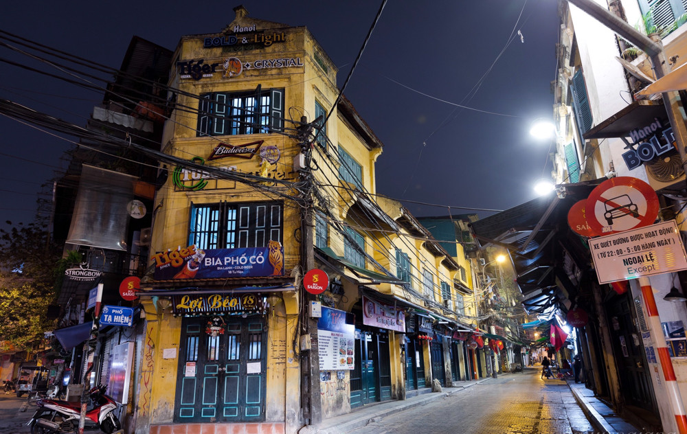 Hà Nội tĩnh mịch mùa COVID-19 qua gương soi bóng nước ảnh 13