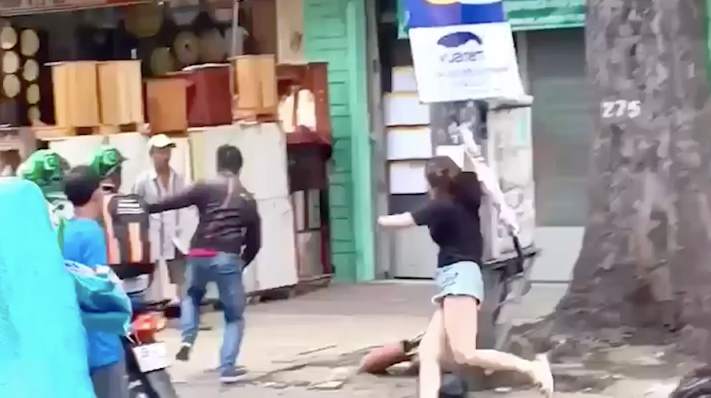 Người phụ nữ chạy BWM rượt tông nam thanh niên ảnh 1