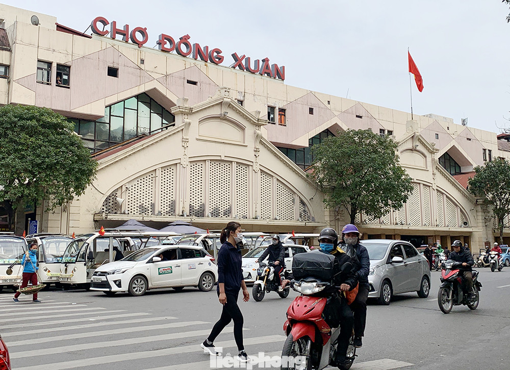 Khách đìu hiu, tiểu thương đeo khẩu trang ngủ gục thời dịch Covid -19 ảnh 1