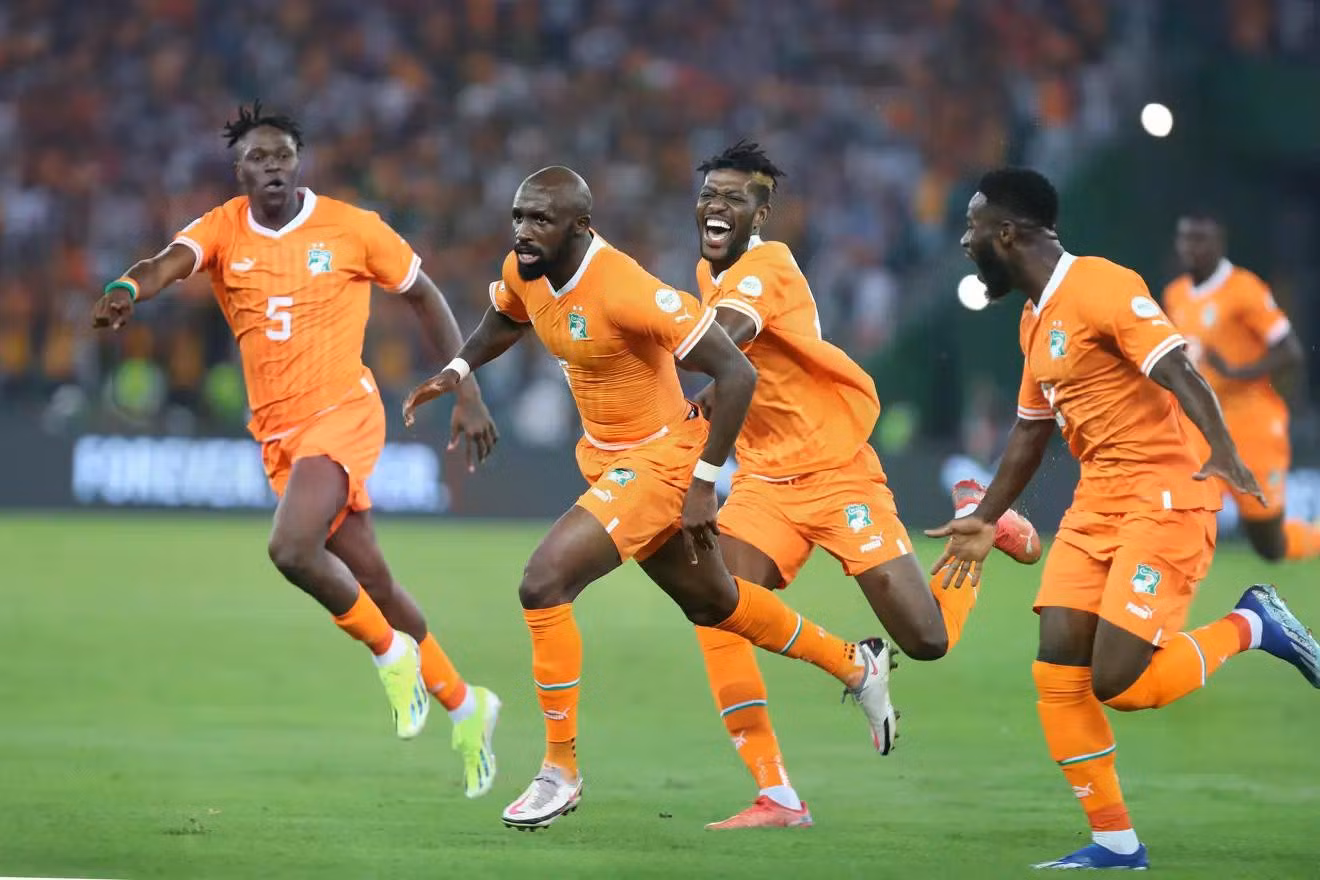 seko-mohamed-fofana-of-cote-divoire-celebrates-goal-with-teammates-during-the-2023-africa-cup-of-nations-match-between-ivory-coast-and-guinea-bissau-at-alassane-ouattara-stadium-in-abidjan.jpg