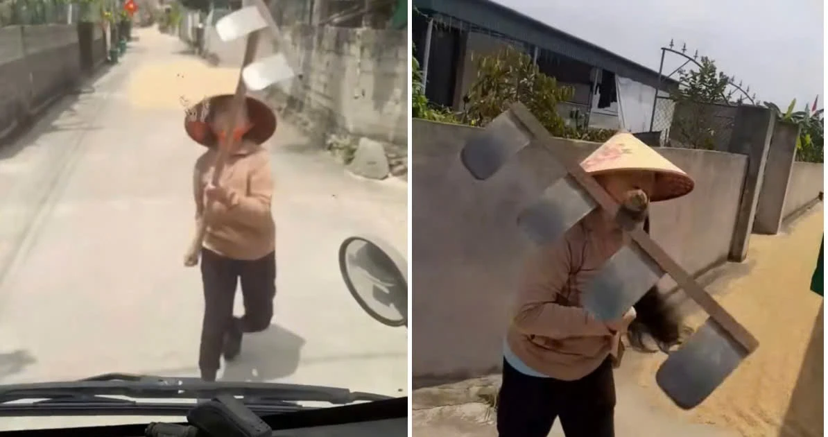 Phơi lúa lấn đường, người phụ nữ dùng cào chặn xe tải, tấn công tài xế