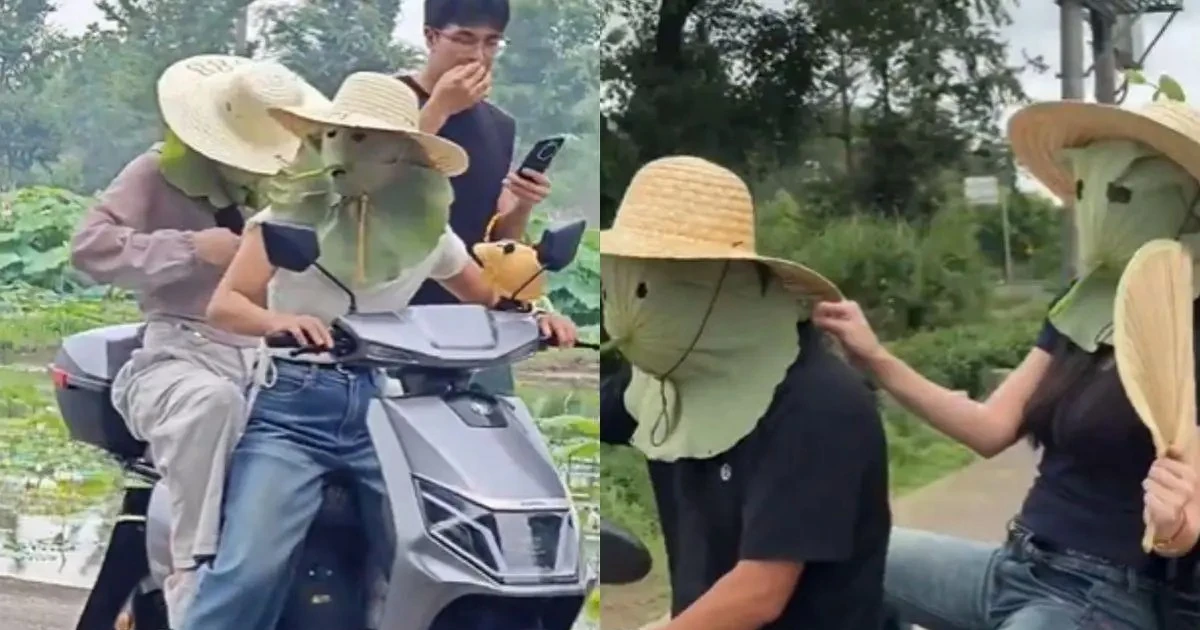 Trời nóng đỉnh điểm, giới trẻ tận dụng lá sen làm "phương tiện" chống nắng độc đáo