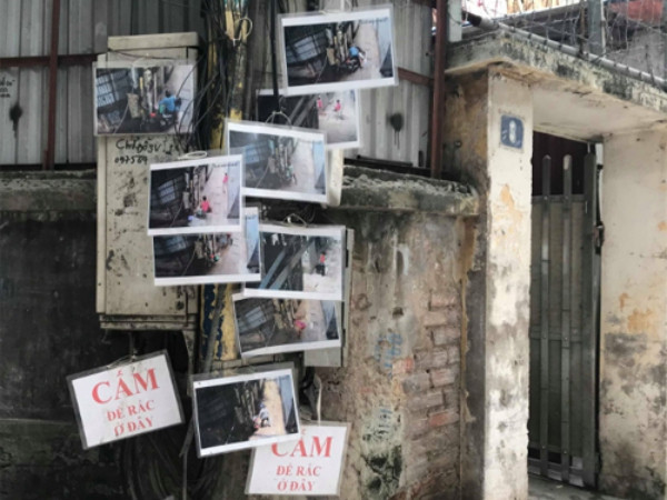 Ngõ nhỏ Hà Nội sạch bong sau khi treo ảnh người đổ rác trộm