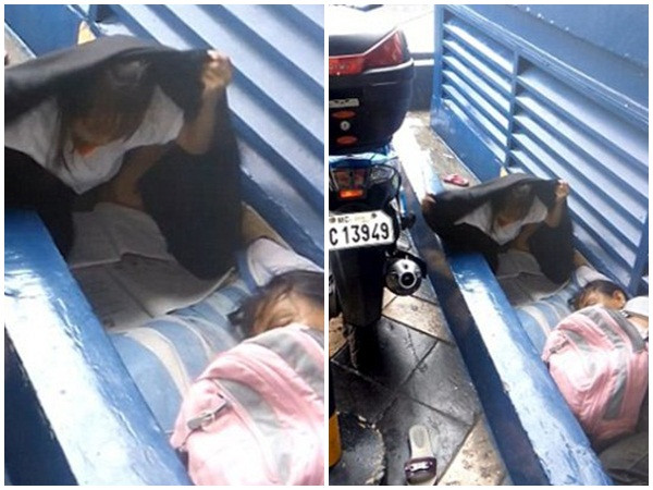 Xúc động khoảnh khắc bé gái vô gia cư "đội mưa" làm bài tập về nhà