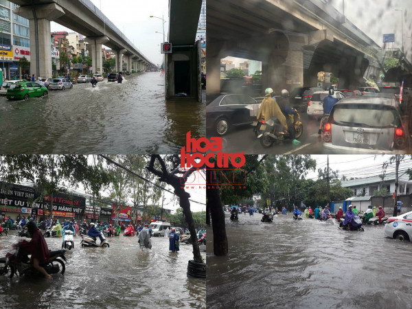 Mưa lớn kéo dài ngày cuối tuần, người dân Hà Nội phải "lội bì bõm" trên đường