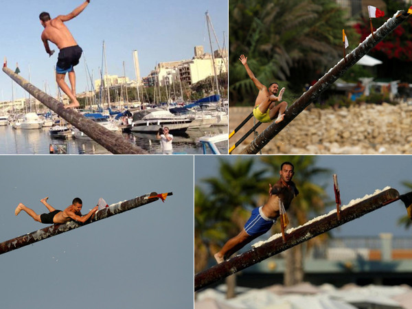 “Cười nghiêng ngả” với cuộc thi leo trên cột mỡ trơn trượt