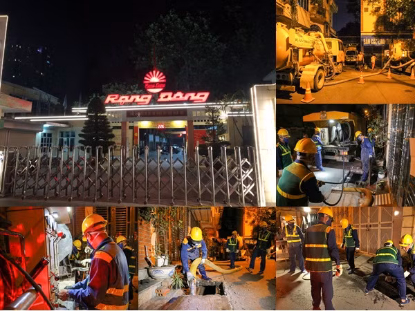 Công nhân làm việc xuyên đêm nạo vét bùn quanh nhà máy Rạng Đông