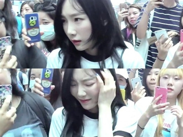 Fan xót xa khi nhìn thấy cánh tay bầm tím của Taeyeon (SNSD) sau sự cố tại sân bay
