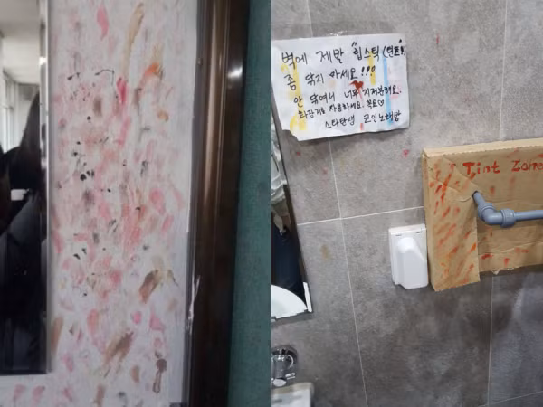 WC nữ tại các trường học dính chồng chéo vết son môi trên tường khiến nhiều người ngao ngán