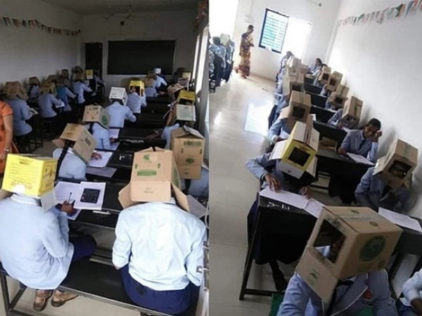 Sinh viên Ấn Độ phải đội thùng carton khi thi cử, trường học bị chỉ trích là nặng nề