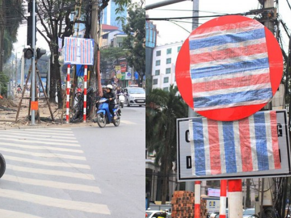 Vừa cắm biển báo xử lý các xe hợp đồng dưới 9 chỗ, Hà Nội vội vàng lấy nylon bịt kín