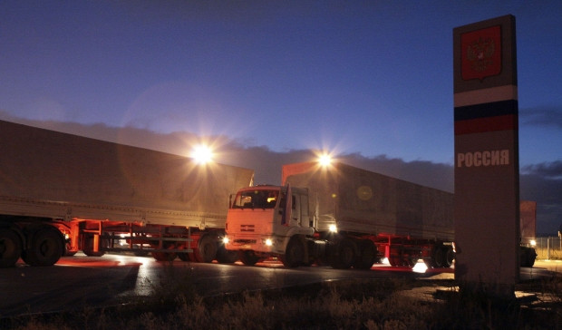 Đoàn xe viện trợ của Nga trở về ngay trong đêm. Ảnh: Reuters