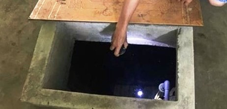 Bỏ thuốc độc xuống giếng nước đầu độc cả gia đình. Ảnh minh họa