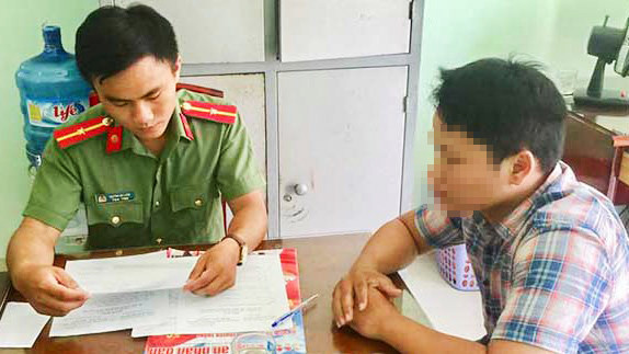 Trần Minh D. làm việc với cơ quan công an.