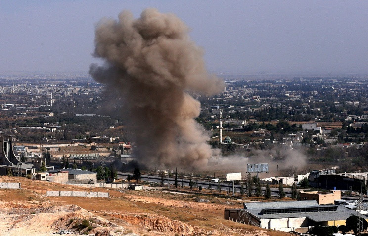 Một mục tiêu khủng bố bị phá hủy trong chiến dịch không kích của không quân Nga. Ảnh: Tass