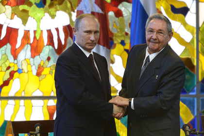 Tổng thống Nga Vladimir Putin và nhà lãnh đạo Cuba Raul Castro trong chuyến thăm Cuba hôm 11/7 vừa qua