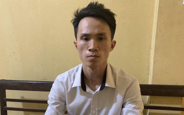 Hưng tại cơ quan điều tra. Ảnh: Minh Trang.