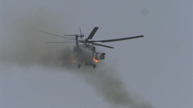 [VIDEO] Trực thăng Nga phóng tên lửa, yểm trợ quân đội Syria tấn công IS