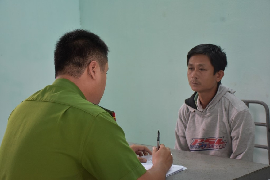 Đối tượng Nguyễn Đức Vinh tại cơ quan công an. Ảnh: Công an