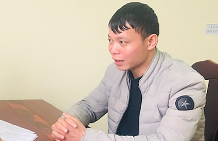 Quang tại cơ quan điều tra. Ảnh: Công an cung cấp.