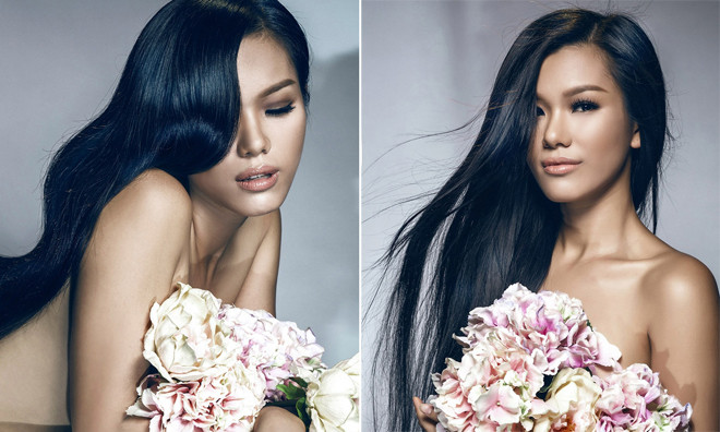 Phương Vy dùng hoa che ngực trần nóng bỏng