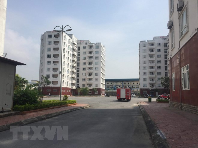 Vị trí đặt cây ATM nằm tại chung cư 9 tầng CT1-thuộc chung cư Than Nam Mẫu, ngay gần quốc lộ 18 và bên cạnh công ty Cao su Sao vàng, có rất đông công nhân đang nằm việc. (Nguồn: TTXVN phát)