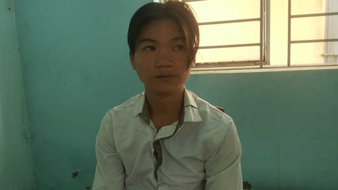 Nghi can Nhàn tại cơ quan công an. Ảnh CA