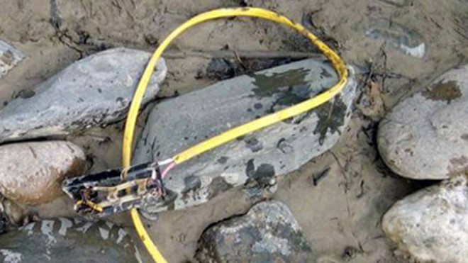 Phụ hồ bị điện giật tử vong khi bơm nước dưới sông