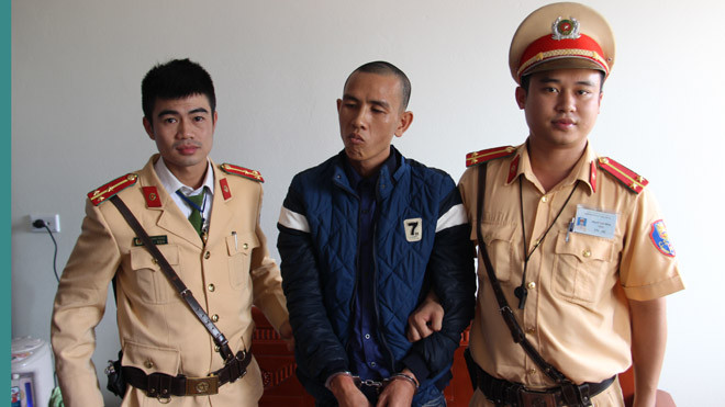 Đối tượng Nguyễn Đức Hải tại cơ quan công an. 