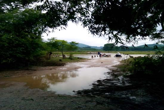 Hiện trường đập tràn cuốn trôi 3 người. Ảnh: Hoàng Lam