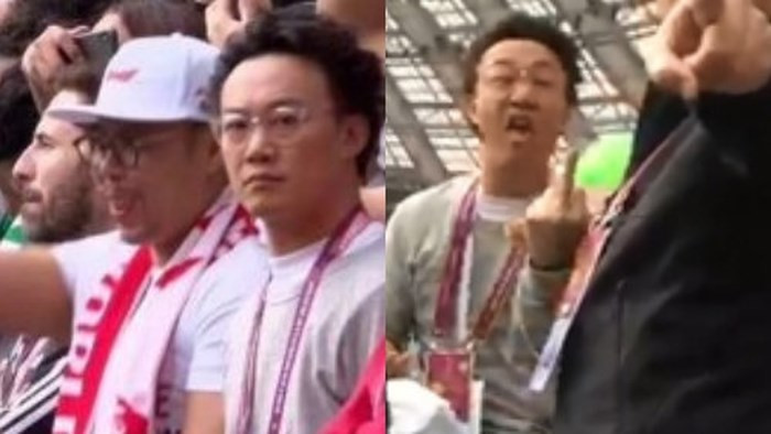 Hành động phản cảm của Trần Dịch Tấn trên khán đài gây bức xúc.