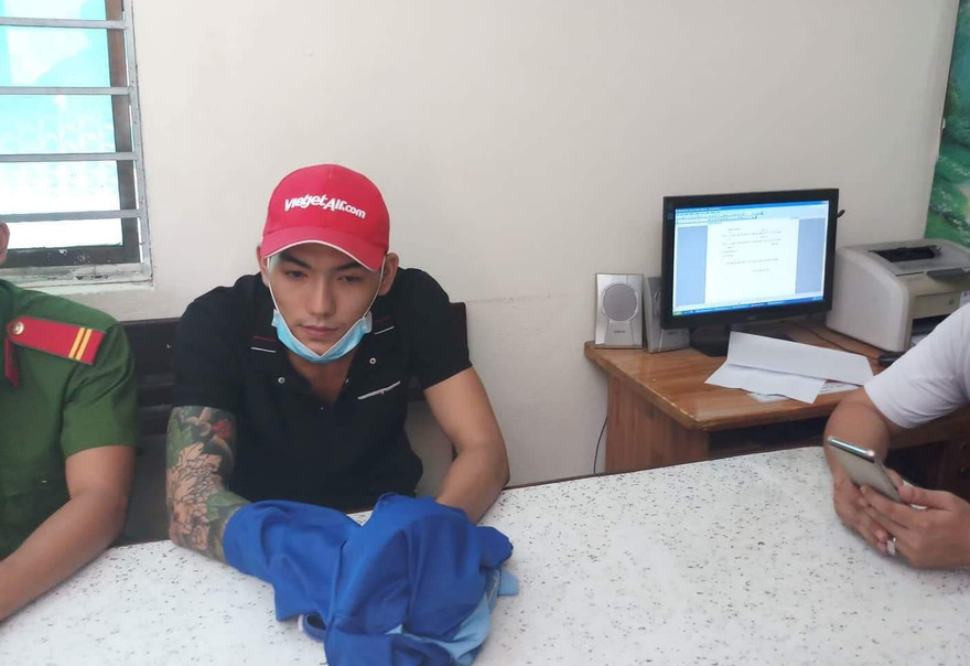 Đối tượng Nguyễn Thành Quang tại cơ quan điều tra. Ảnh: CACC