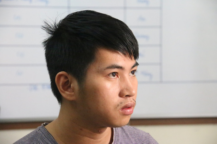 Đối tượng Hồ Xuân Huy tại cơ quan công an. Ảnh H.Q.V