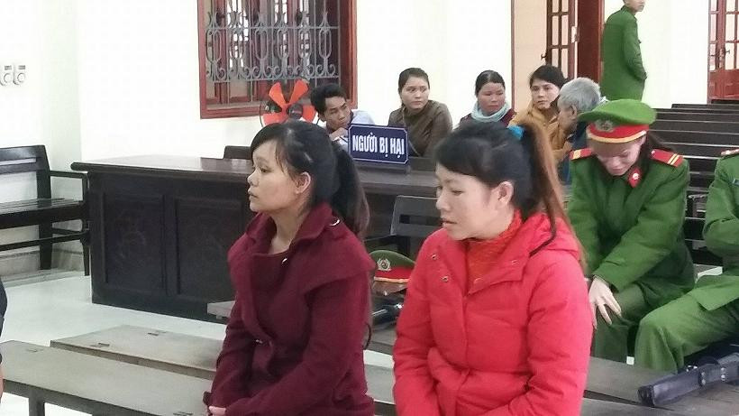 Hai bị cáo trong phiên xét xử ngày 23/2.