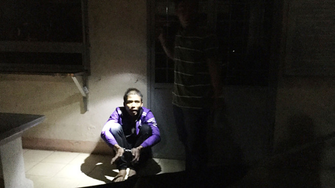 Nghi can Hảo tại cơ quan điều tra. Ảnh CA