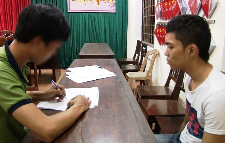 Đối tượng Win tại cơ quan công an (ảnh: A.Phong)