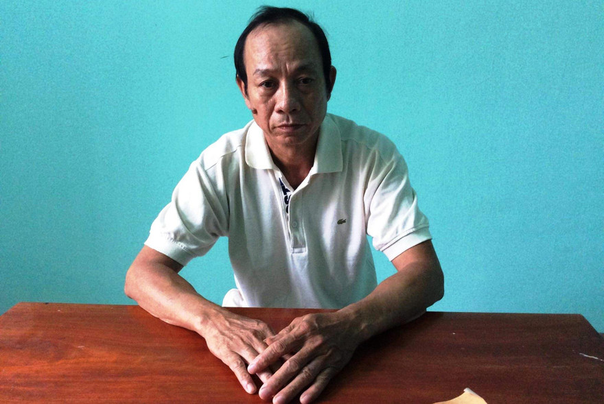 Nghi phạm Nguyễn Quốc Long tại cơ quan công an