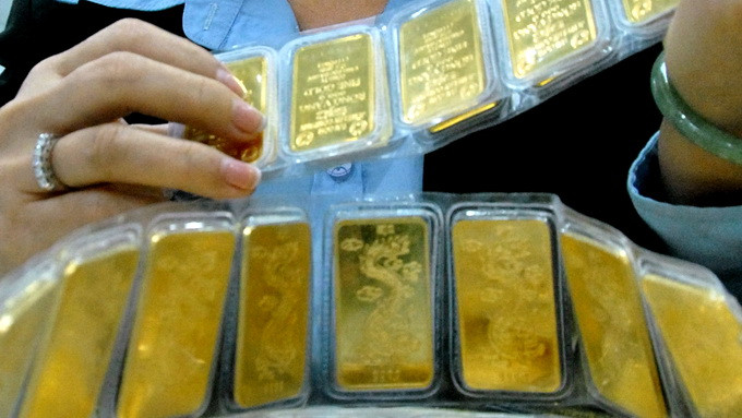 Cuối tuần, vàng và USD cùng đi ngang