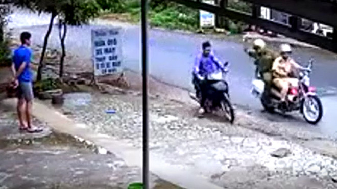 Đối tượng Kim Đông (bìa trái) bị công an khống chế, bắt giữ (ảnh trích từ video)