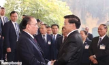 Tổng Bí thư, Chủ tịch nước Lào thăm nguyên Tổng Bí thư Nông Đức Mạnh